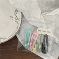Détail d'un lot de 5 barrettes colorées dans une pochette zippée avec des paillettes fines - Style Goutte d'eau Scintillant (H6.5) / 5 Pièces / Multicolore