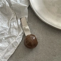 Detailed view of silver hair clip with brown marble texture planet bead on white background - Dark Coffee Marble Bead Duckbill Clip