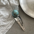 Close-up of silver metal BB hair clip with a blue marble texture resin sphere bead - Blue Green Marble Bead BB Clip