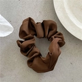 Detailed view of coffee brown satin scrunchie with elegant pleated texture and soft glossy finish - Small / Dark Coffee