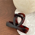 Detailed shot of tortoiseshell bow hair claw clip on a rustic wooden and paper background - Matte Bowknot Straight (Red Tortoiseshell) / Matte Red Tortoiseshell Straight Style