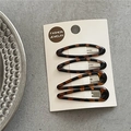 Set of four tortoiseshell hair clips in oval and waterdrop shapes on a white card - Brown Combination (Large)