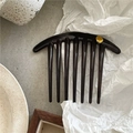 Detailed macro of the vintage tortoiseshell hair comb with gold metallic accent detail - 7 Teeth / Transparent Black Gray (Side Comb)
