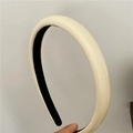 Detailed close-up of a thick cream PU leather headband with black non-slip lining - Off White