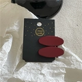 Pair of matte burgundy oval hair clips on a handmade card, close-up luxury metal hairpins - Solid Oval Style