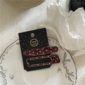 Detailed view of burgundy polka dot hair clip set on a decorative white porcelain plate - Duckbill Clip Pair / Wine Red - Rectangular and Wave