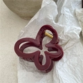 Dettaglio della pinza per capelli a farfalla rosso vino con finitura lucida - Pinza per Capelli Fiore Rosso