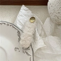 Detail of plush off-white mohair hair clip with engraved gold oval metal buckle - Beige Rectangle (BB Clip)