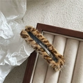 Detail of plush leopard print rectangular hair clip on a beige velvet display tray - Khaki Rectangle