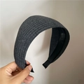 Detail of dark grey knitted wide headband with vertical stripes and anti-slip inner teeth - Dark Gray
