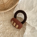 Detail of wool felt croissant hair tie with a thick brown braided rope hair band - Baguette / Dark Coffee