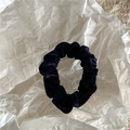 Close-up of deep blue velvet scrunchie showing detailed ribbed texture on soft fabric - Navy Blue