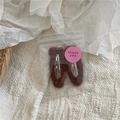 Detail of two brown plush drop hair clips in a transparent bag with thank you sticker - Brown
