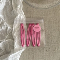 Detailed view of four pink metal hair clips in clear packaging with a thank you sticker - H6.5 Rose Red (Pea Shape)