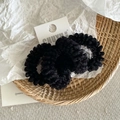 Detailed view of two black lace ruffled hair scrunchies with white card packaging - Mesh Hair Tie / Black