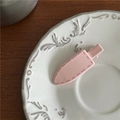 Pink matte duckbill hair clip with stitch design on a decorative ceramic plate - Pink Waterdrop (Duckbill Clip)