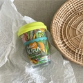 Close-up of colorful high-elastic hair bands in a creative fruit tea cup container - Fruit New Jar / Yellow