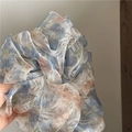 Detail of floral printed mesh scrunchie with soft pastel colors and translucent fabric - White Brown Blue Floral