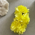 Macro detail of large yellow flower hair clip with realistic satin petals for summer styling - Yellow