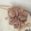 Detail macro shot of large organza scrunchie in soft dusty rose pink mesh fabric - Dusty Pink