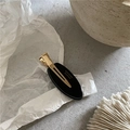 Détail de la pince à cheveux ovale noire avec texte France Handmade sur clip doré - Pince À Bec De Canard Ovale / Noir (48-B10)