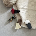 Detail of colorful resin hair clips with star, heart and oval shapes on textured fabric - Star/Heart Style (F7.2 Type E 1 Plastic Duckbill Clip)