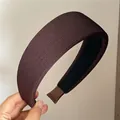 Detail of coffee brown ribbed fabric headband with inner anti-slip black lining - Dark Coffee