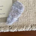 Detailed macro view of the multi-colored plush fabric texture on a water-drop hair clip - White Purple Blue (G6.3)