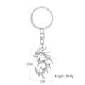 Vue détaillée du porte-clés dragon argenté avec dimensions 45x25mm et poids 10,6g - Dragon de Flamme