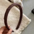 Detail of dark brown wool wrapped headband showing soft texture and handmade craftsmanship - Coffee