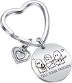Macro detail of Tell Your Friends music ghost engraving on stainless steel keychain - Silver (Musical Ghost)