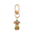 Portachiavi cane Teddy in lega con cappello verde e chiusura a moschettone dorata - Cane Teddy