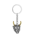 Dettaglio del portachiavi maschera Hannya vintage con corna dorate e catena argento - Corno d'Oro