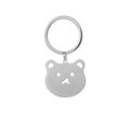 Dettaglio ravvicinato di un portachiavi a forma di orso in metallo dal design traforato - Portachiavi Orsacchiotto (Argento)