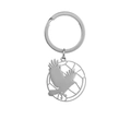 Macro view of silver stainless steel keychain featuring a hollow eagle silhouette pendant - Bird Silhouette Style