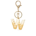 Detail of resin letter W keychain with gold foil, white stones, and silk tassel - White Tassel W