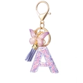 Purple resin letter A keychain with butterfly charm and purple tassel for handbags - Purple A