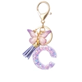 Letter C resin keychain with purple glitter, butterfly pendant, and lavender tassel - Purple C