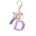 Purple resin letter D keychain with sparkling star sequins, butterfly and tassel charm - Purple D