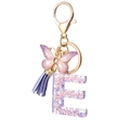 Purple resin letter E keychain with glitter stars, butterfly charm and leather tassel - Purple E