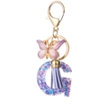 Letter G resin keychain with purple butterfly and lavender tassel in gold finish - Purple G