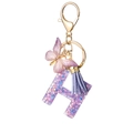 Letter H purple resin keychain with gold butterfly charm and lavender suede tassel - Purple H