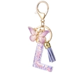 Letter L keychain with purple resin star filling, butterfly charm and suede tassel - Purple L