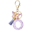 Purple resin letter O keychain with butterfly charm and tassel gold lobster clasp - Purple O