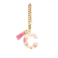 Pink tassel keychain featuring letter C resin pendant filled with heart sequins - Letter C