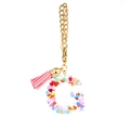 Pink tassel keychain with golden chain and letter G resin charm filled with heart sequins - Letter G