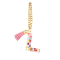 Pink tassel keychain with transparent resin letter L filled with colorful heart sequins - Letter L