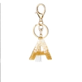 Porte-clés lettre A en résine avec pierres blanches, feuilles d'or et pompon - Frange Blanche A