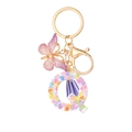 Porte-clés lettre Q en résine avec paillettes violettes et pompon en soie élégant - Paillettes Violettes Gland Lettre Q