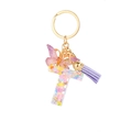 Porte-clés lettre T en résine avec paillettes violettes, papillon et pompon - Paillettes Violettes Gland Lettre T